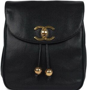 Chanel Black Backpack with Gold Accents